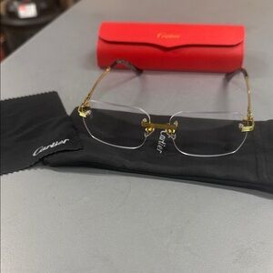 Cartier Gold and Black Rimless Eyewear